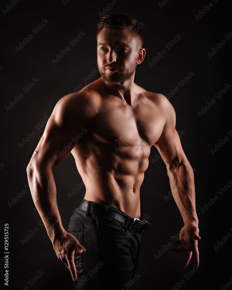 Bodybuilder Posing. Muscles shoulders and press. Bodybuilder Posing. Muscles shoulders and press.