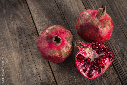 Pomegranate on wooden background