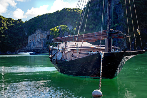 A fishing boat in Ha Long bay Vietnam