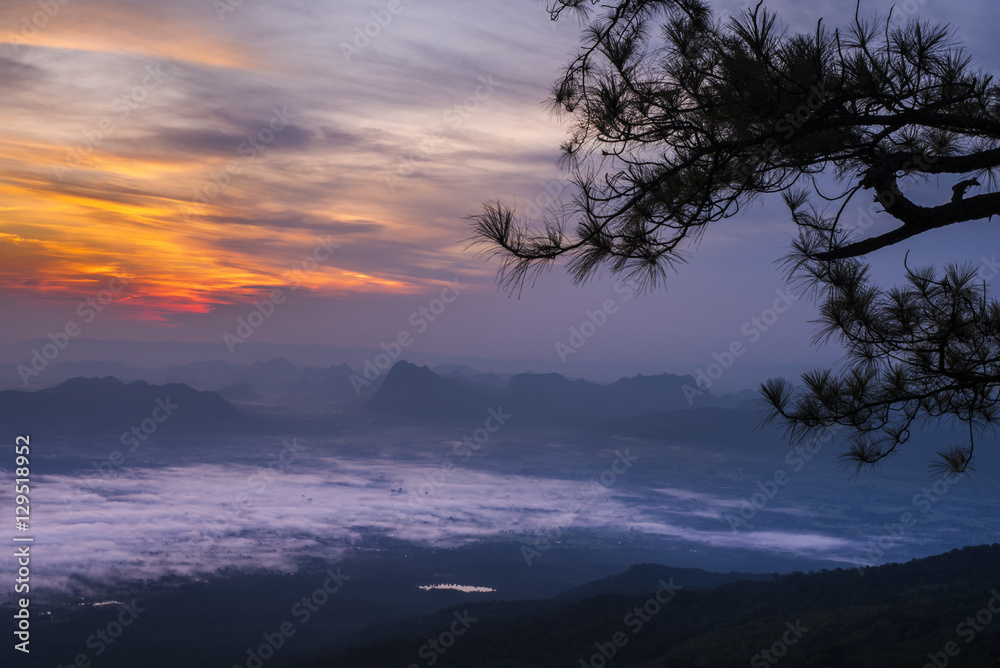 Mountain with mist at sunrise, Phu Kradueng national park ,Loei Thailand.