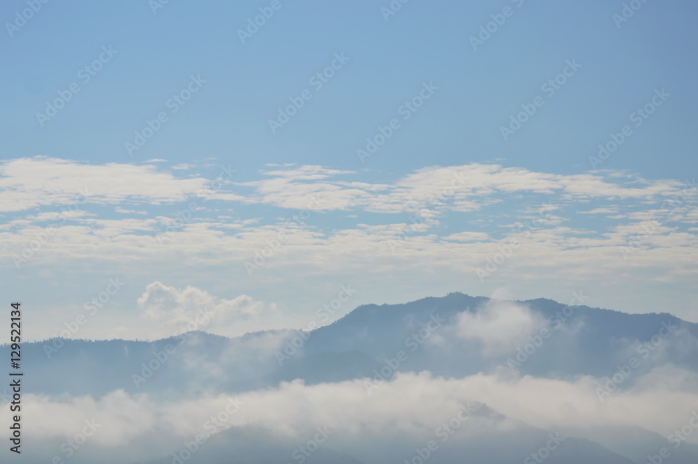 mist and cloudy floating on mountain in sunny day