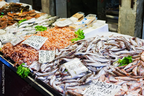 fish on ice in market in Venice city