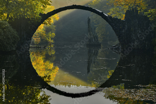 Amazing place in Germany - Rakotzbrucke also known as Devils Bridge in Kromlau. photo