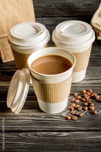 coffee cup take away at wooden background