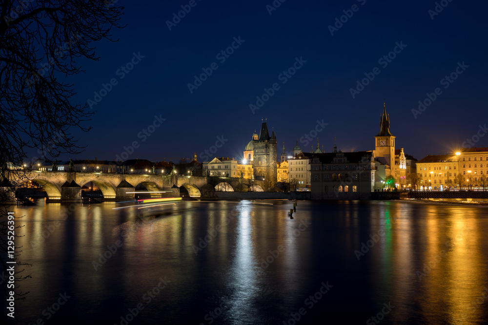 Night photo of Prague Charles Bridge and Powder tower