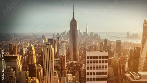 Aerial view of Manhattan skyline. Close up. Sunset. Vintage. Time lapse. photo