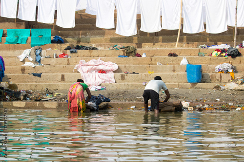 people work. doing the laundry, praying to the Ganges india Varanasi Ceremony Manikarnika

 photo