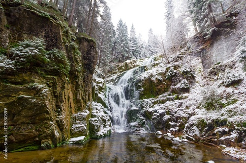 Snowy Waterfall in the park, Winter landscape