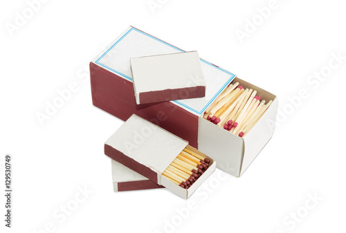 One large and several small matchboxes of wooden safety matches