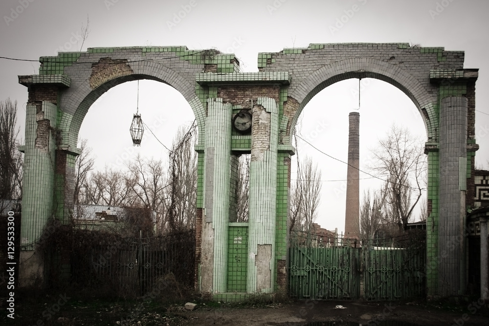 Ukraine, Odessa area destroyed factory. Ruined stone, brick arch and the ruins of the destroyed building or premises.