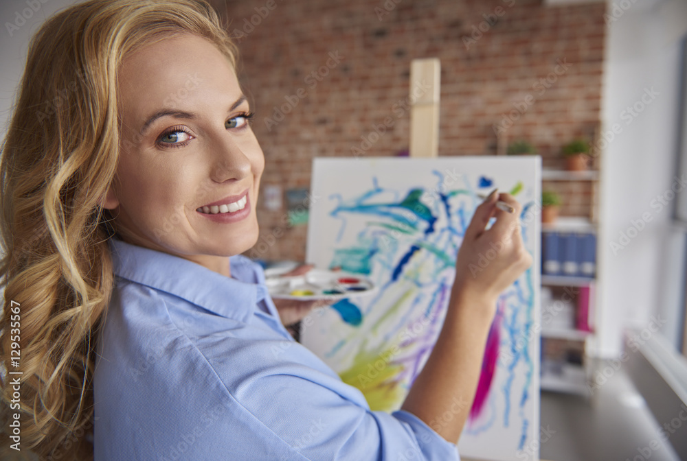 Portrait of cheerful young artist Portrait of cheerful young artist