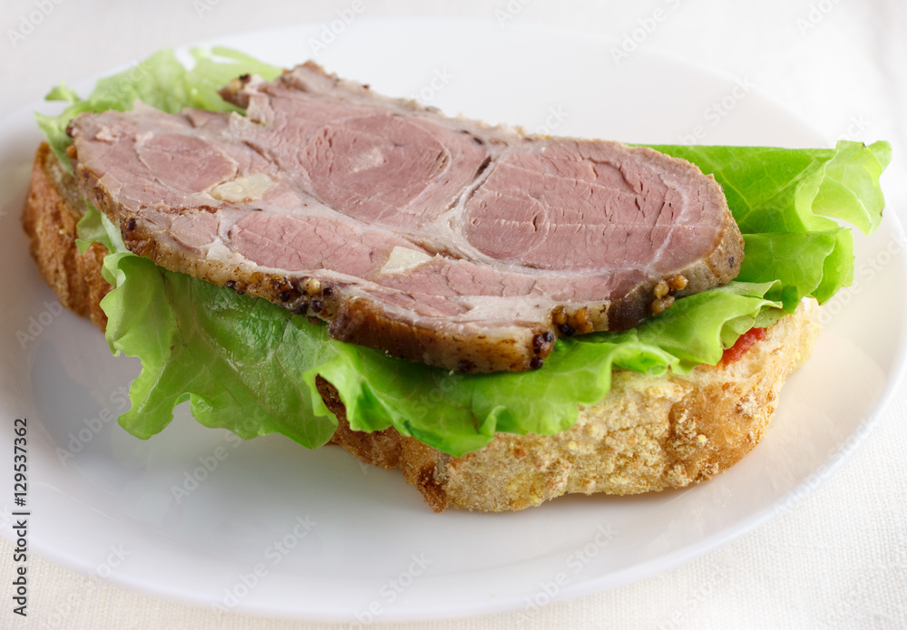 sandwich with greens and meat