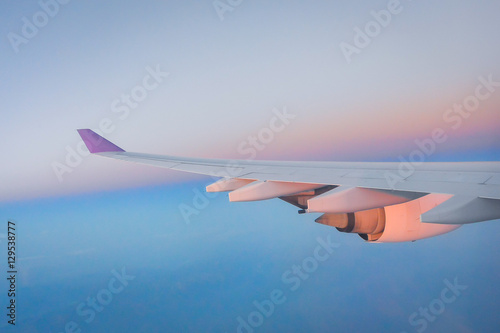 Adventure, travel, transport concept. View from plane window at