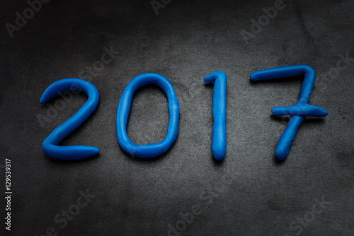 Numbers for 2017 New Year made from blue plasticine.