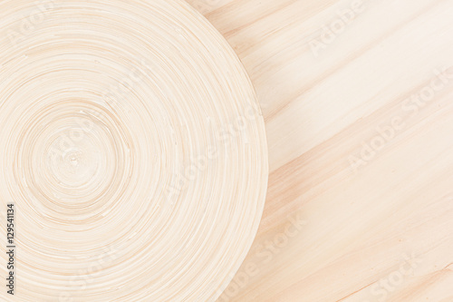 Soft beige white wooden background with abstract circles. Wood texture. Top view.