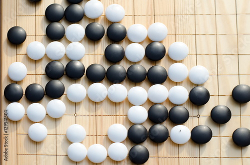 Chinese board game go  with black and white stones
