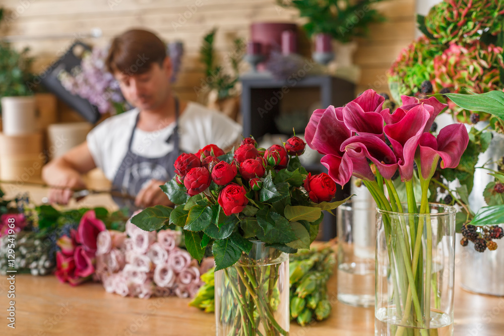 Flowers delivery shop and florist unfocused