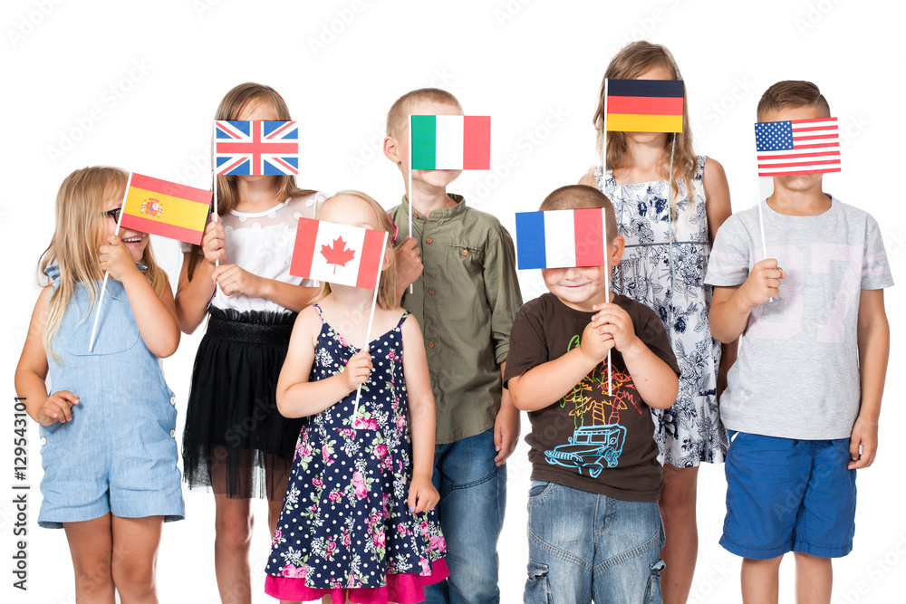 poland group holding flags of different countries. German flag, flag england, spain flag, flag of america, flag of russia, france flag, flag canada
