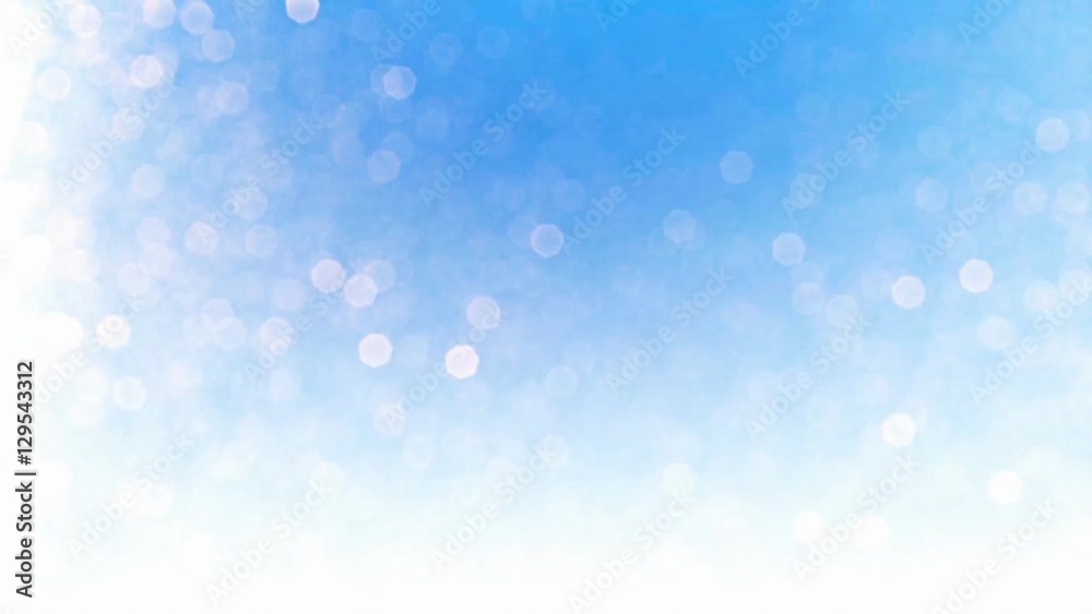 Beautiful snow particles bokeh, against blue Beautiful snow particles bokeh, against blue