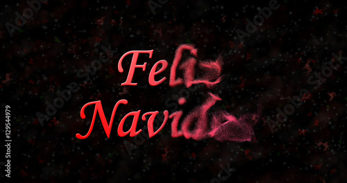 Merry Christmas text in Spanish "Feliz Navidad" turns to dust from right on black background