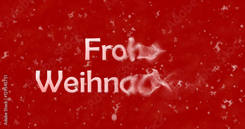 Merry Christmas text in German "Frohe Weihnachten" turns to dust from right on red background