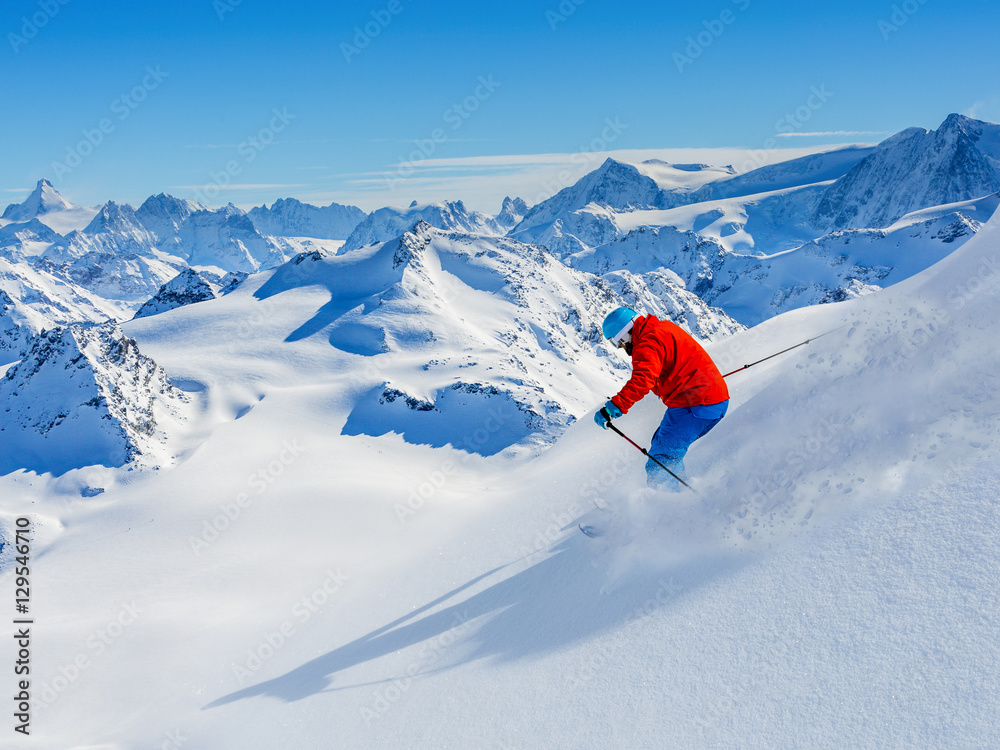 Skiing with amazing view of swiss famous mountains in beautiful Skiing with amazing view of swiss famous mountains in beautiful