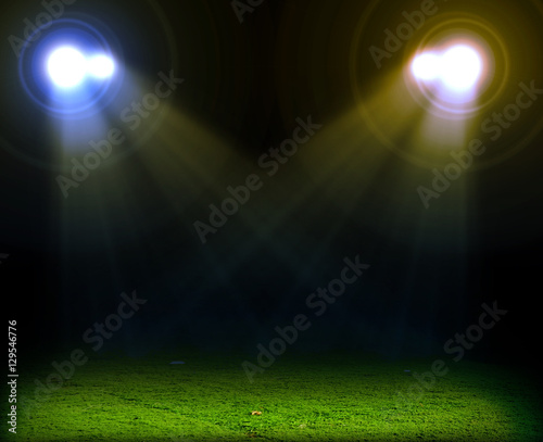 Green soccer field, bright spotlights © Kalawin