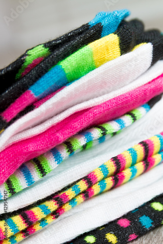 Pile of colorful socks. Close up.
