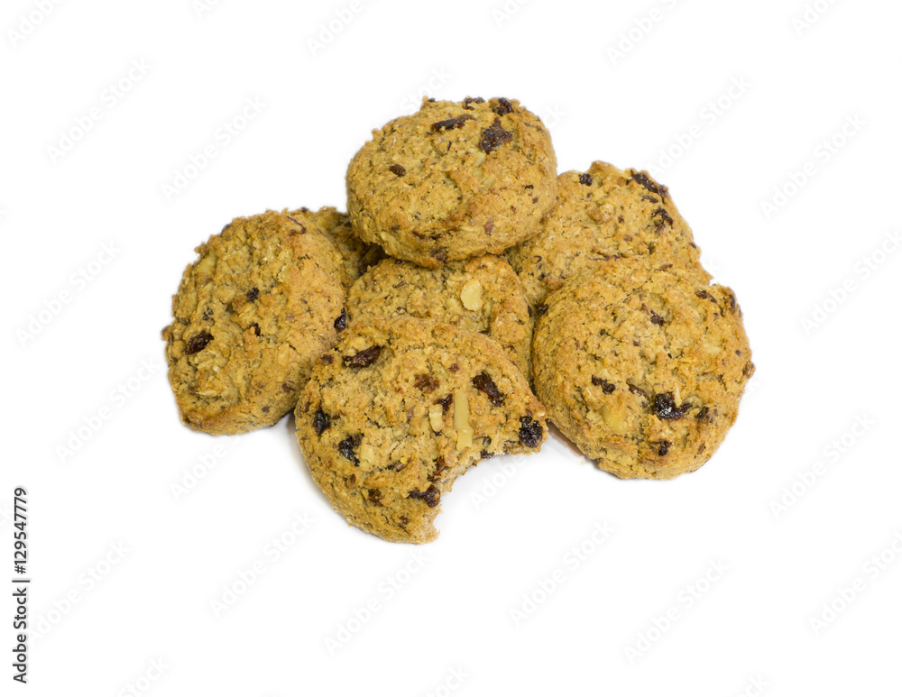 Isolated Oatmeal Raisin Cookies With A Bite Taken Out Of One Isolated Oatmeal Raisin Cookies With A Bite Taken Out Of One