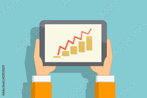 growing chart of coins on the tablet screen
