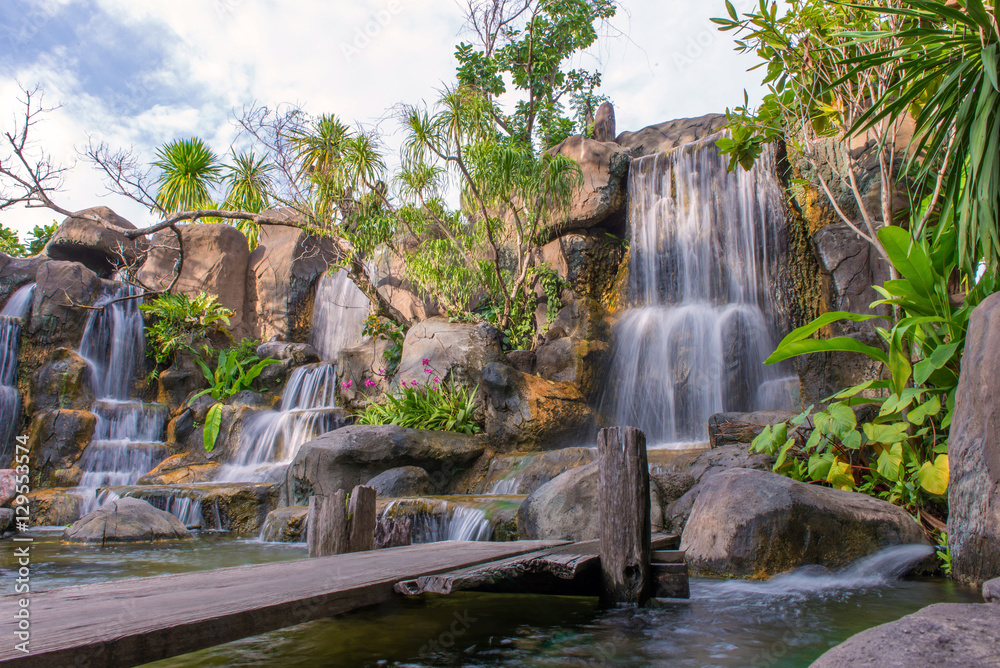 Fototapeta premium Waterfall in garden at the public park