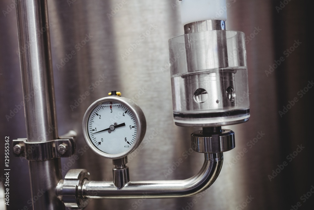 Pressure gauge on storage tank in brewery Stock Photo | Adobe Stock