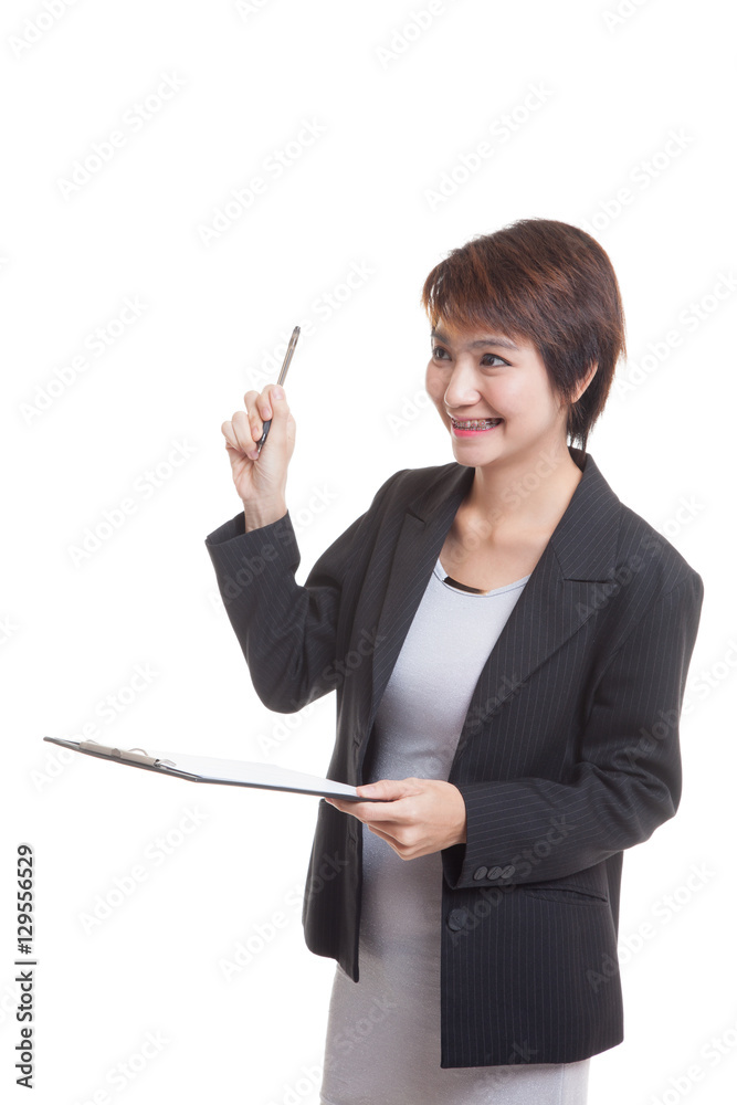 Young Asian business woman with pen and clipboard. Young Asian business woman with pen and clipboard.