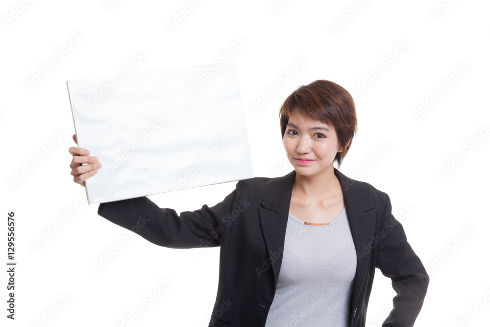 Young Asian business woman with white blank sign. Young Asian business woman with white blank sign.