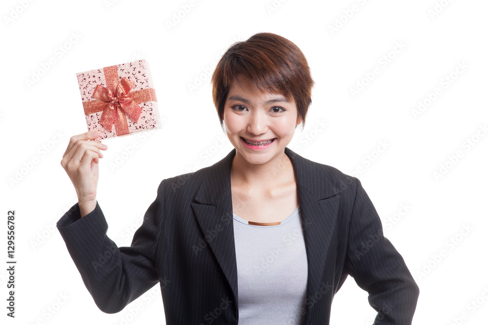 Young Asian business woman with a gift box. Young Asian business woman with a gift box.