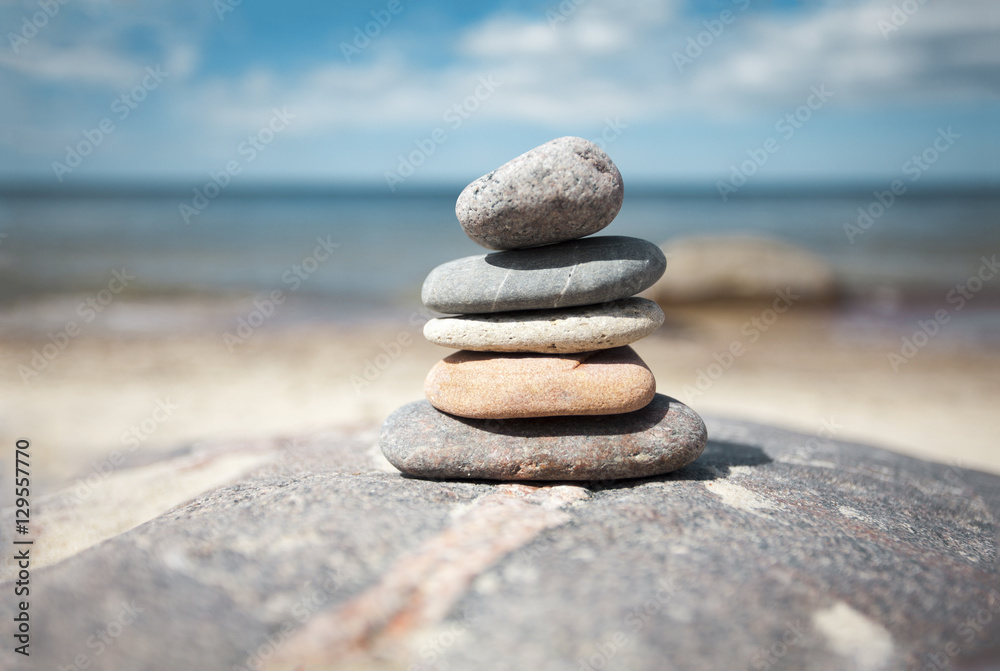 Stack of stones on the seaside in summer Stack of stones on the seaside in summer