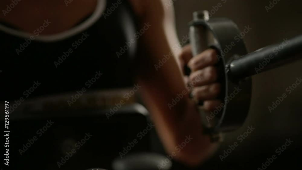 Seated Row Technique. An athletic girl demonstrates a perfect muscles
Seated Row Technique. An athletic girl demonstrates a perfect muscles
