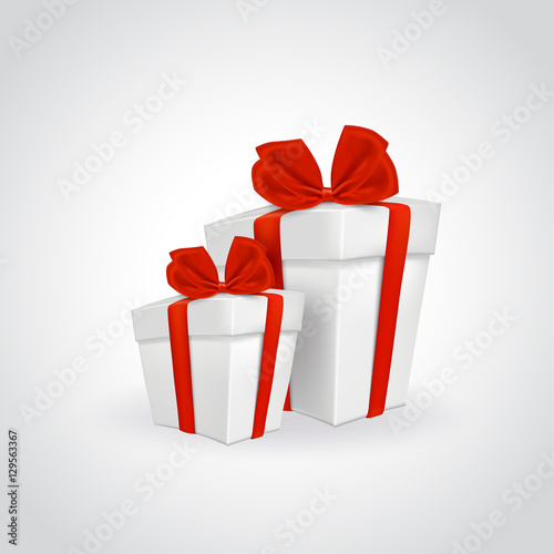 Two white gift boxes with red ribbon.