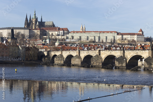 Autumn Lesser Town of Prague with gothic Castle and Charles Bridge, Czech Republic