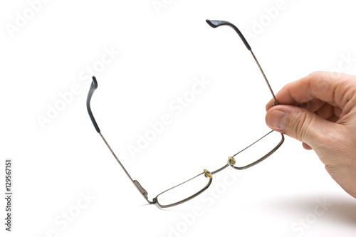 hand holds glasses