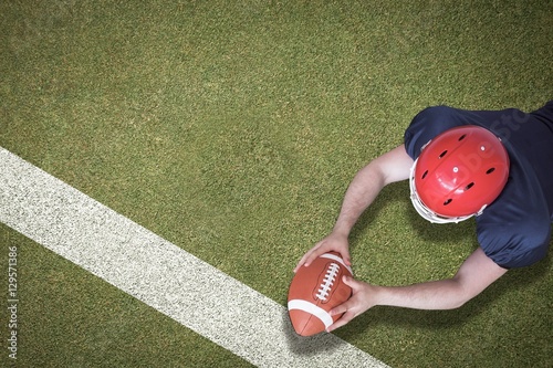 Tableau sur toile Composite image of american football player scoring a touchdown