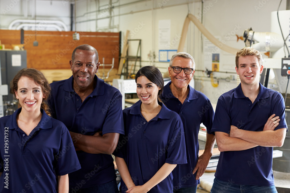 Portrait Of Carpenters In Busy Woodworking Factory Portrait Of Carpenters In Busy Woodworking Factory