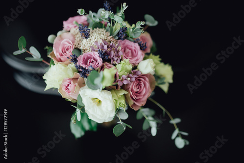 big beautiful bridal bouquet lying on the table