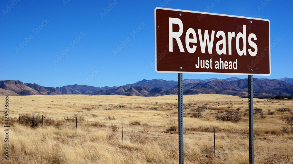Rewards brown road sign