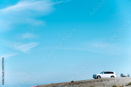car with blue sky photo