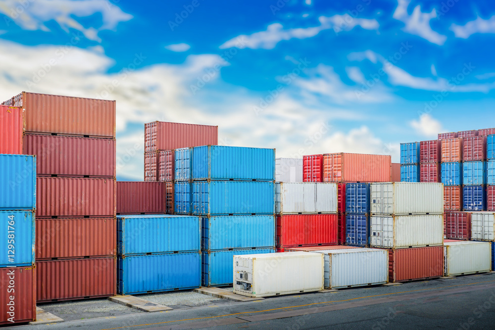 Industrial port with container yard in day blue sky with clouds Industrial port with container yard in day blue sky with clouds