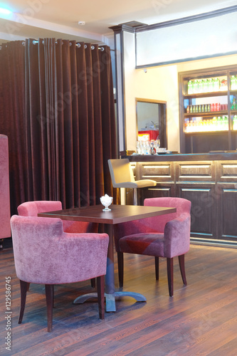 Interior of a cafe with bar stand photo