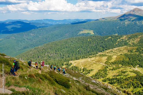 A group of tourists traveling in the Carpathian mountains