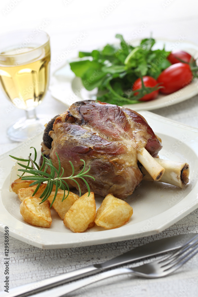 pork shank with roasted potatoes, italian cuisine, stinco di maiale con patate arrosto pork shank with roasted potatoes, italian cuisine, stinco di maiale con patate arrosto