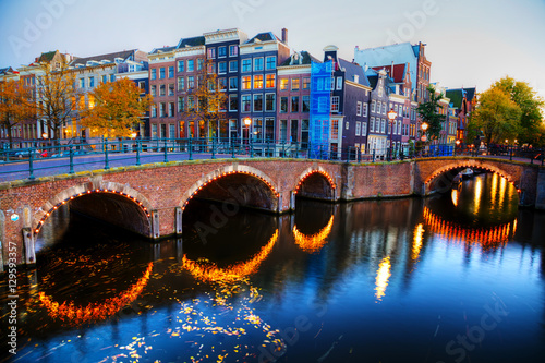 Amsterdam city view with canals and bridges
